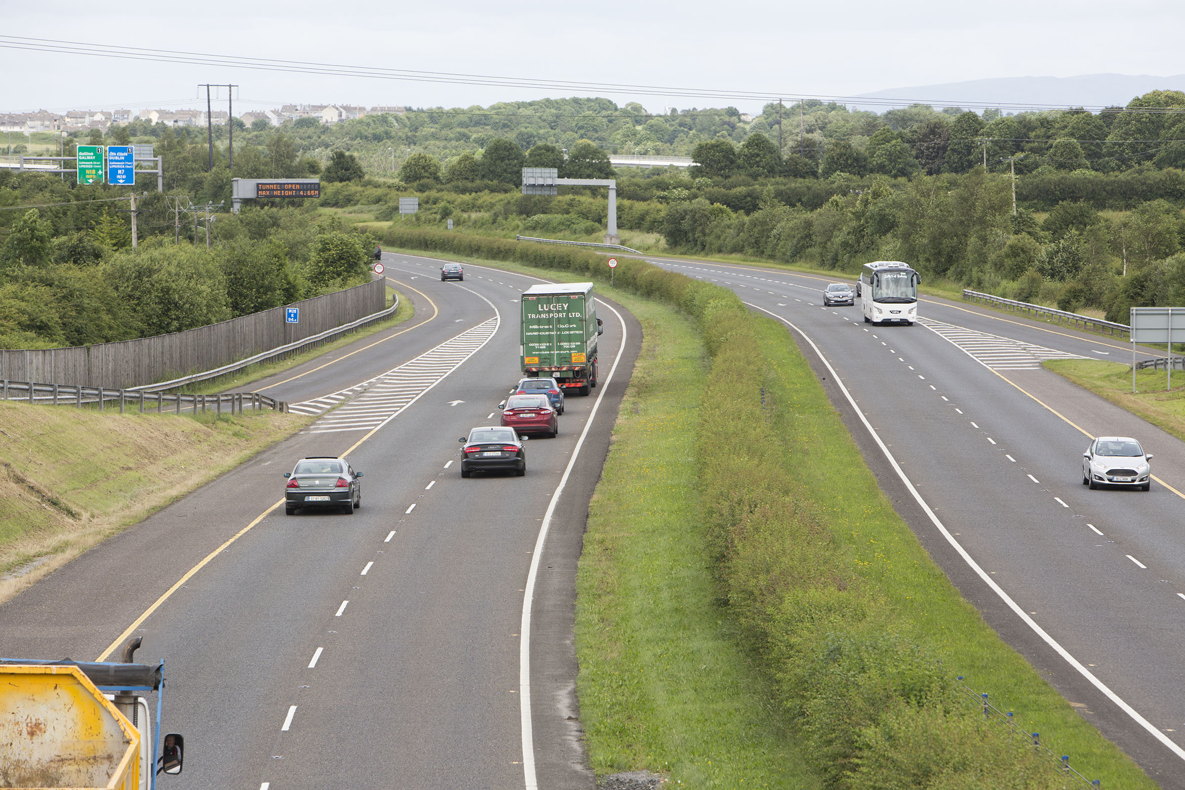 Busy motorway with cars moving on both sides